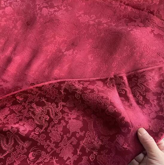 Dark red color silk jacquard fabric with dragon pattern,  Cosplay dress fabric