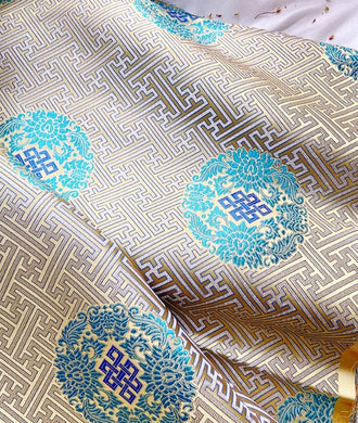 Retro Chinese patterned blue gold brocade fabric