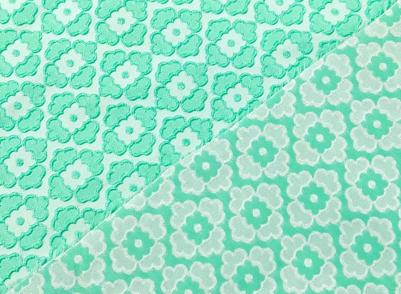 Relief jacquard mint green textured three-dimensional small flower art jacquard fabric Hanfu skirt designer fabric, fabric by the yard