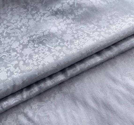 Silver grey color silk jacquard fabric with dragon pattern,  Cosplay dress fabric