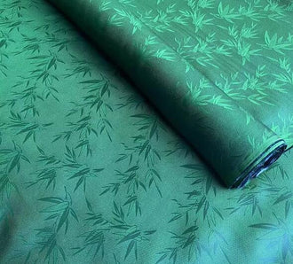 Green color silk jacquard fabric with Bamboo leaves,  Cosplay dress fabric