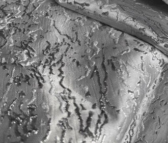 Silver water flow texture three-dimensional texture fabric irregular jacquard fabric skirt clothing designer fabric